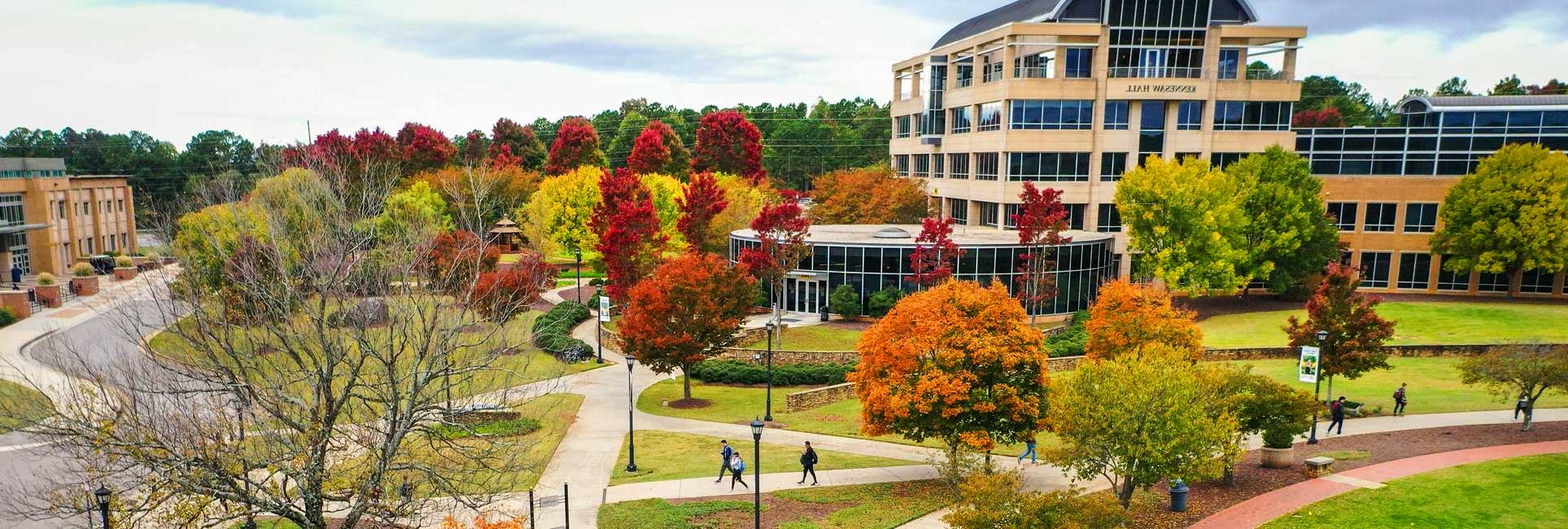 Aerial view of Kennesaw Campus featuring Kennesaw Hall main campus building during the fall