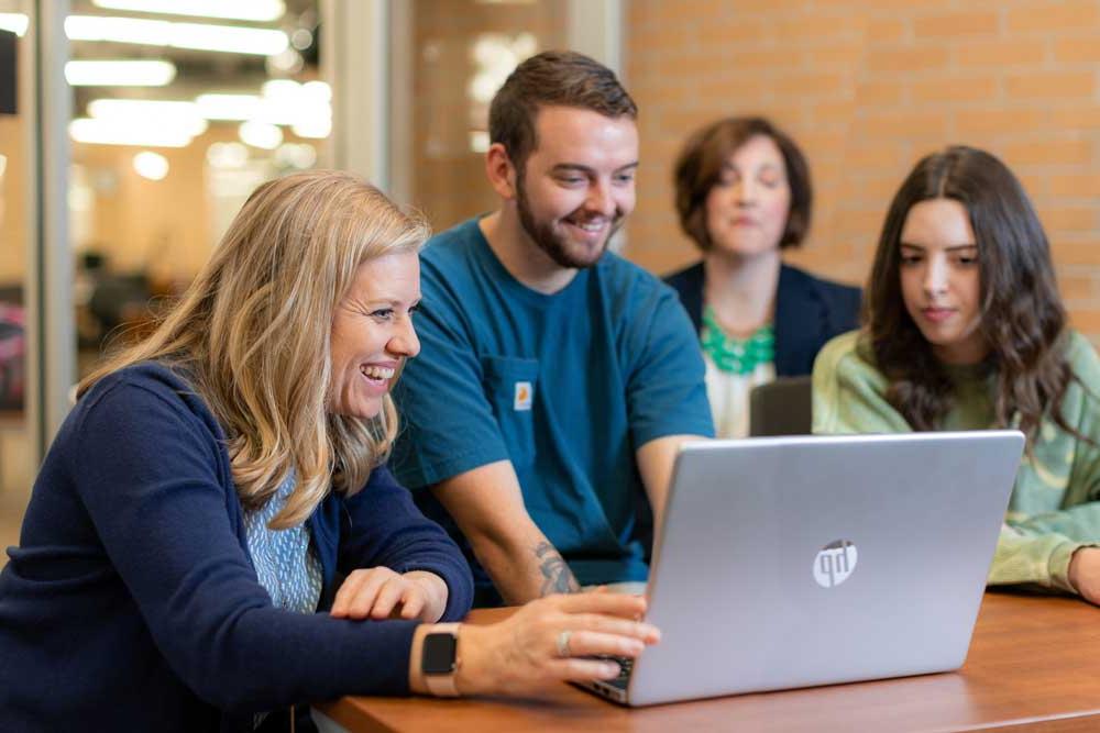 students on laptop